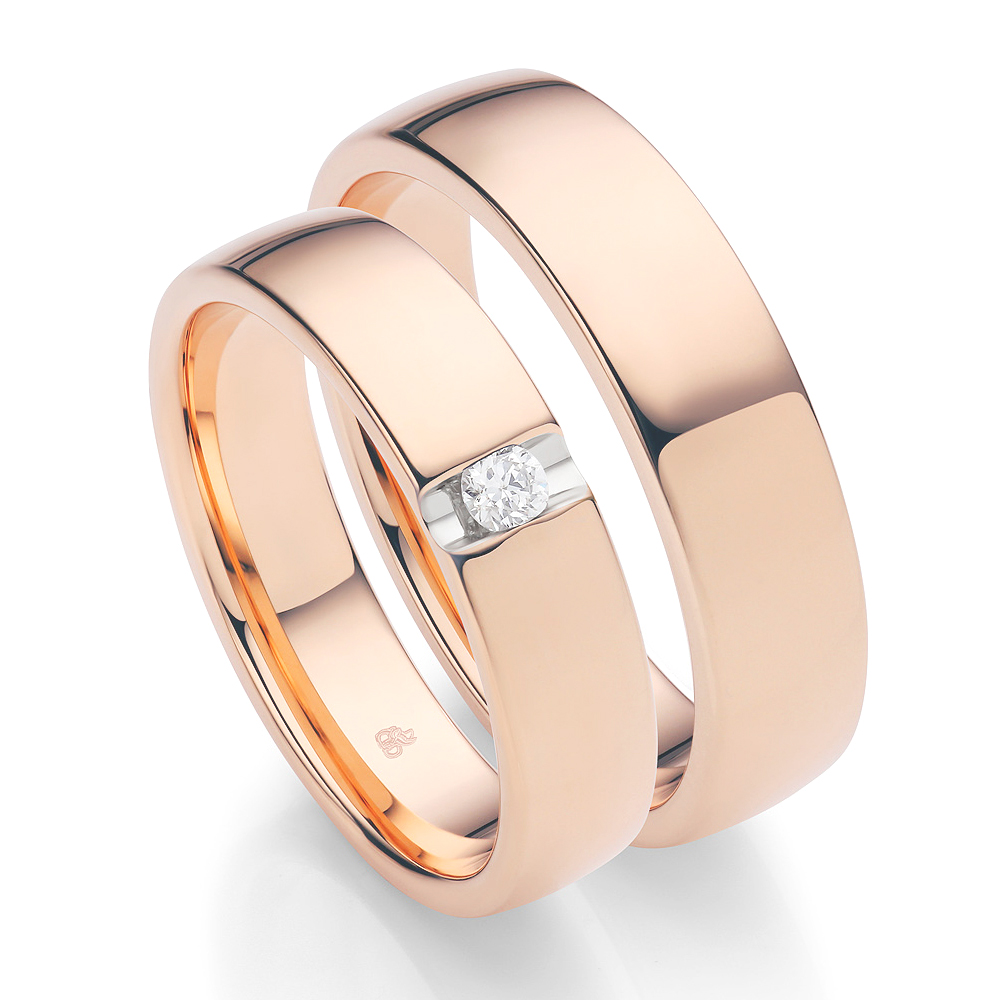 Eheringe aus Roségold mit einem Diamant 8299